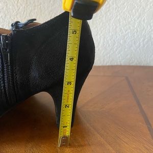 Black lace up heeled booties